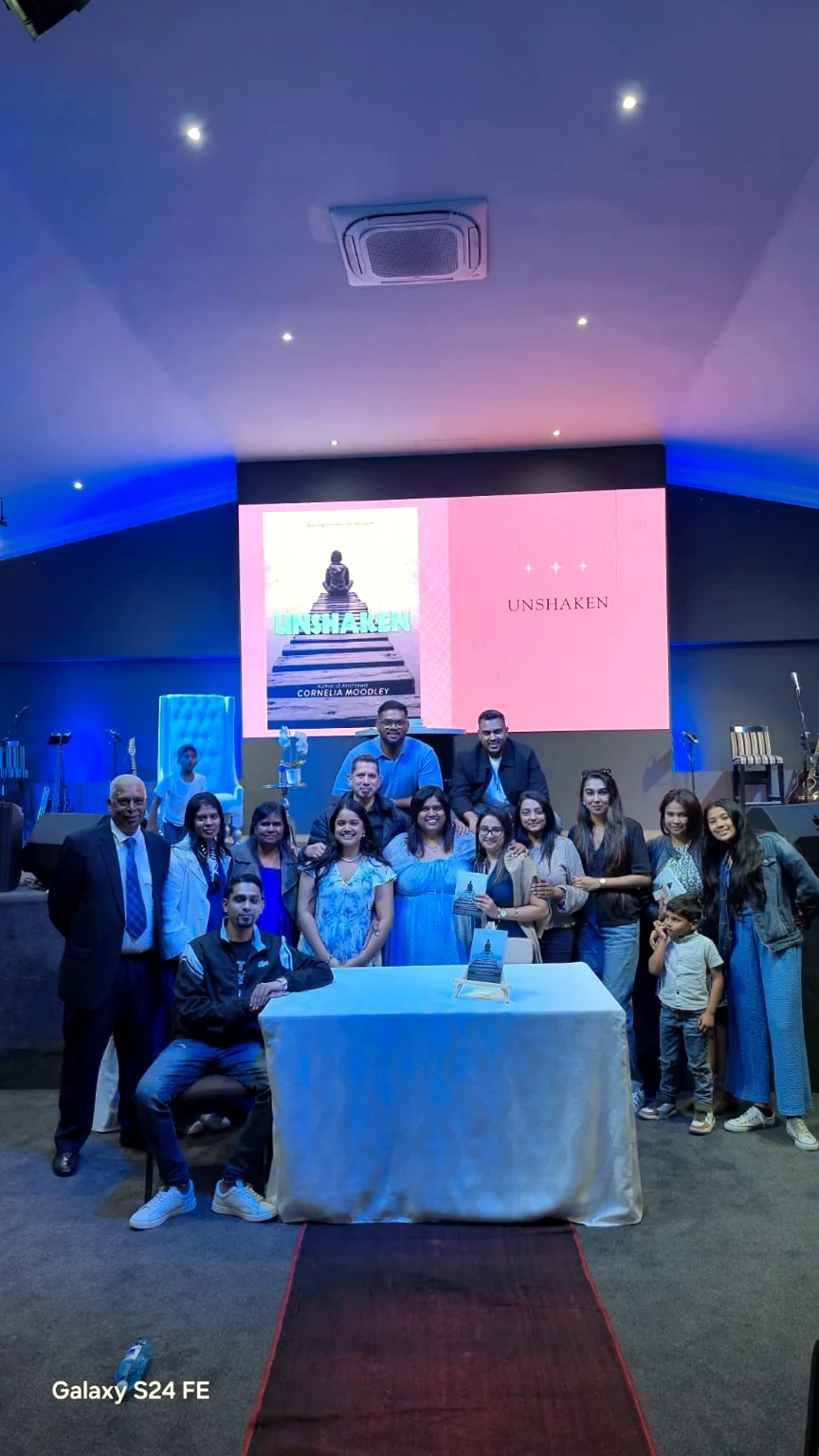 Cornelia Moodley celebrating a book launch with family and community